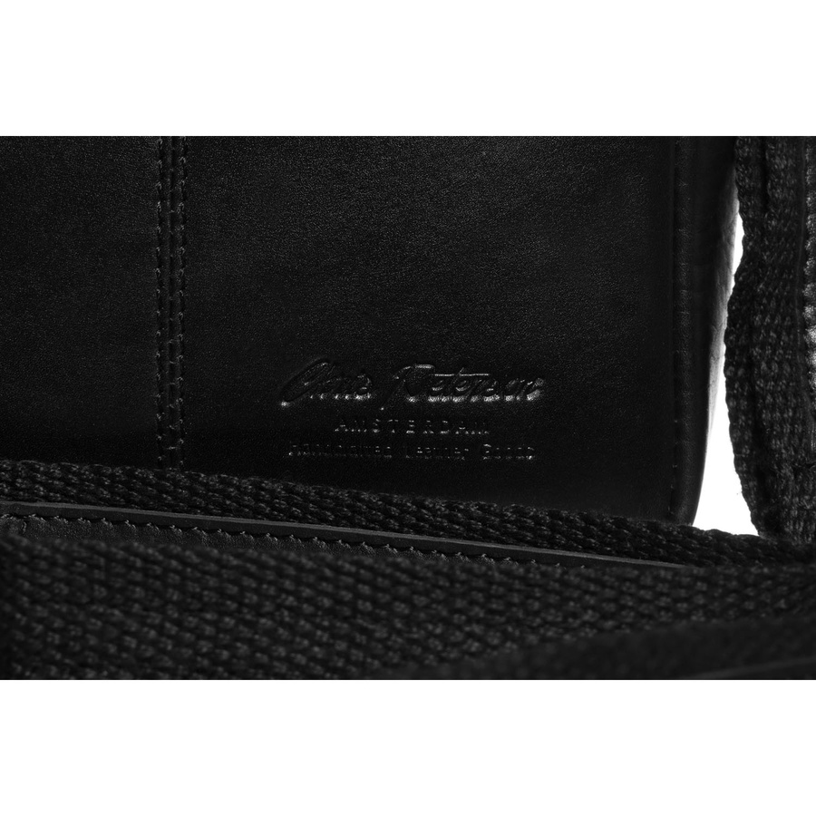 Skórzana, czarna torba męska na ramię zamykana suwakiem i klipsem magnetycznym - Peterson