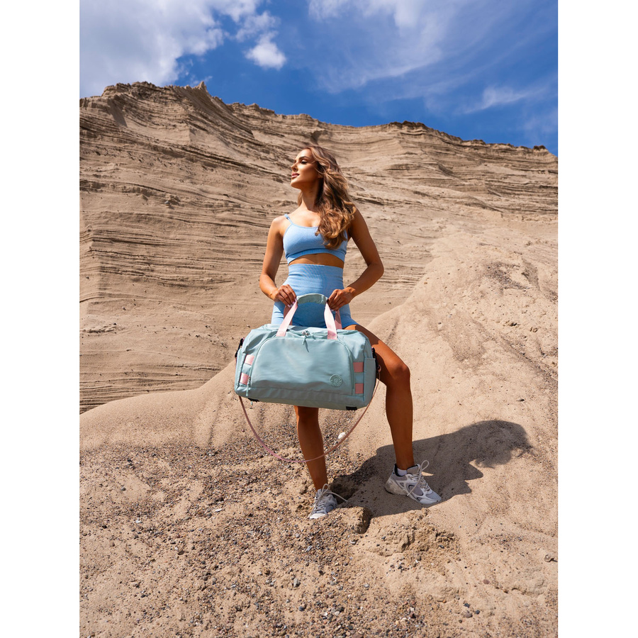 Zielono-różowa torba weekendowo-podróżna z uchwytem na walizkę i kieszenią zewnętrzną - Peterson