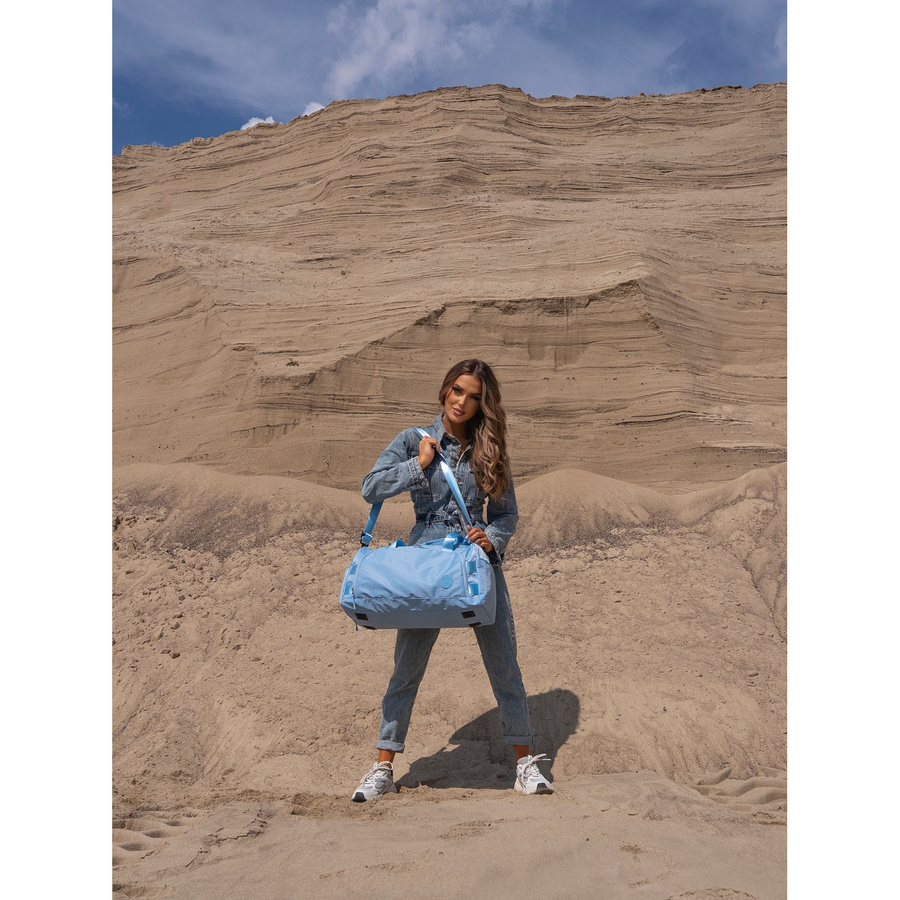 Weekendowa torba podróżna w błękitnym kolorze z uchwytem na walizkę - Peterson