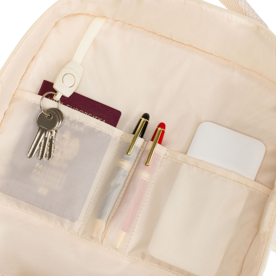 Praktyczny plecak podróżny w kolorze ecru, wyposażony w siatkowaną przegrodę i paski kompresyjne - Peterson