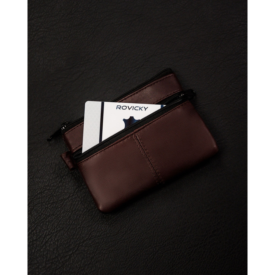 Etui ze skóry naturalnej w brązowym kolorze z kieszonkami na suwak