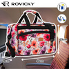 Wielokolorowa torba podróżna z wytrzymałego poliestru z portem USB, pokryta roślinnym wzorem - Rovicky