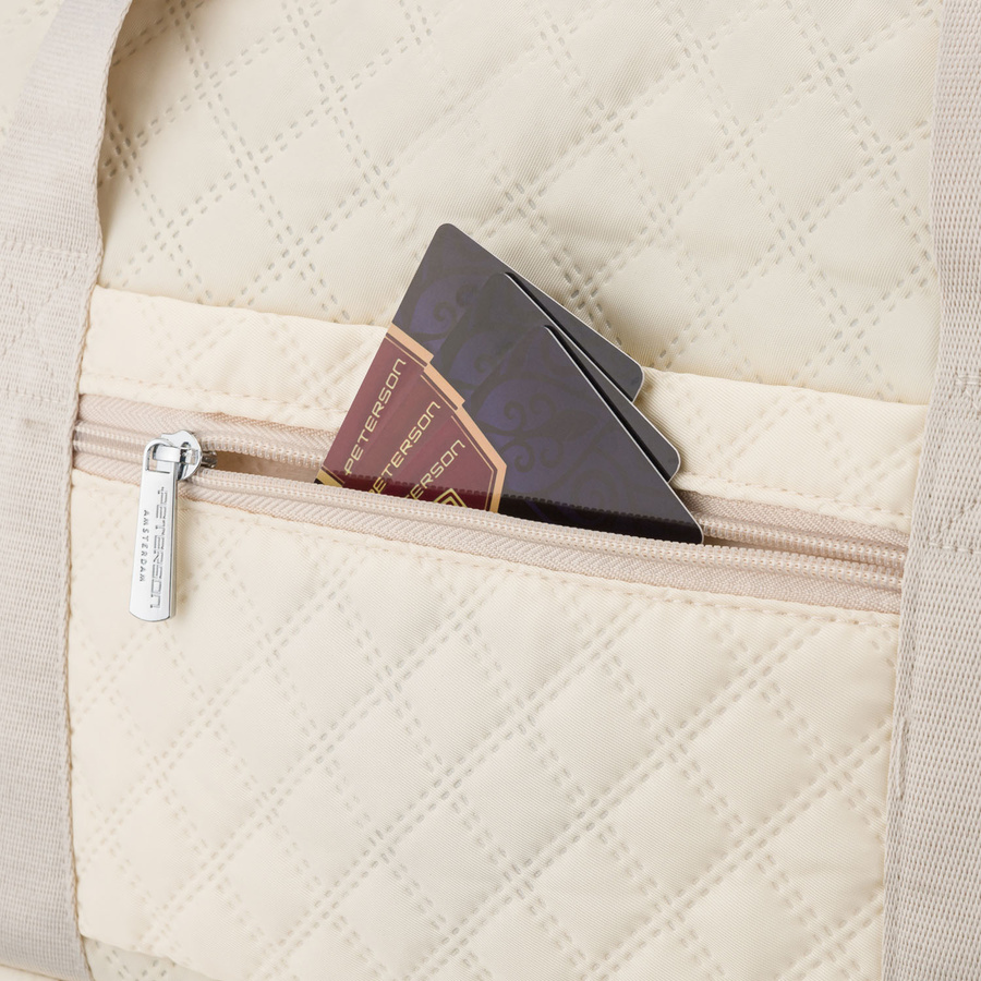 Sportowa, treningowa torba w beżowym kolorze wykonana z poliestru - Peterson