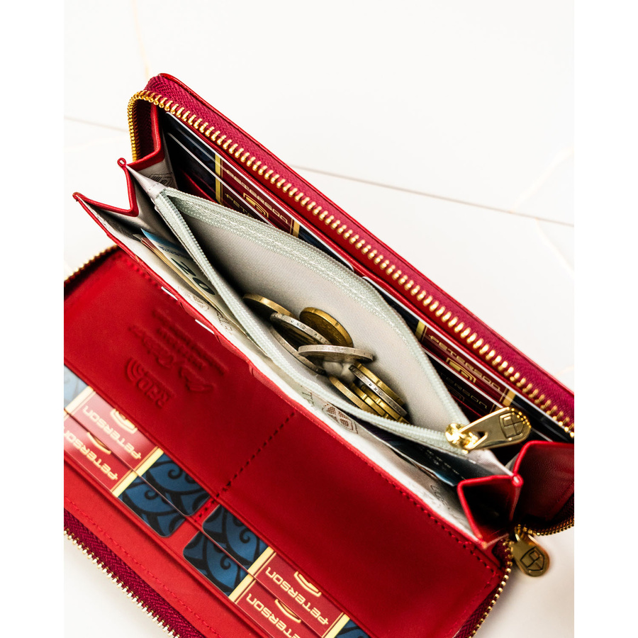 Duży portfel damski z lakierowanej skóry naturalnej w czerwonym kolorze zamykany suwakiem - Peterson