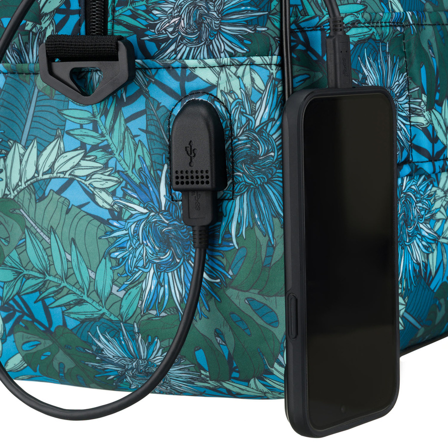 Pojemna torba podróżna wyposażona w dopinany pasek i zewnętrzną kieszeń zapinaną suwakiem - Rovicky