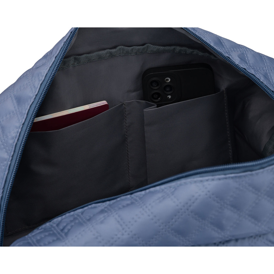 Treningowa torba wykonana z poliestru w niebieskim kolorze, dwukomorowa i zamykana suwakiem - Peterson