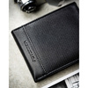 Zestaw prezentowy: skórzany portfel męski w czarnym kolorze bez zapięcia i czarny pasek ze skóry ekologicznej - Peterson