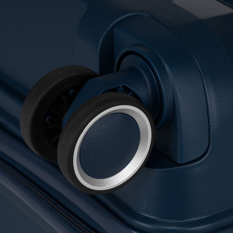 Granatowa, duża walizka z polipropylenu z obrotowymi kółkami - Peterson