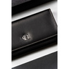 Skórzany, duży portfel damski w czarnym kolorze zamykany na zatrzask - Rovicky
