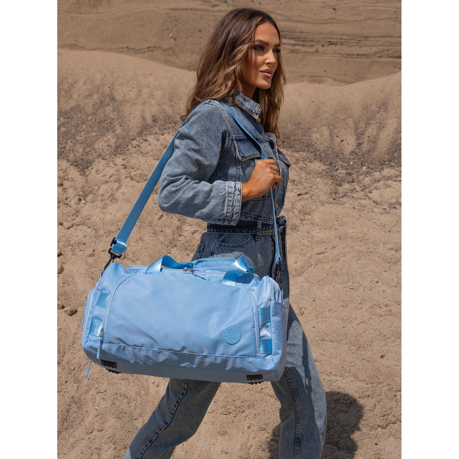 Weekendowa torba podróżna w błękitnym kolorze z uchwytem na walizkę - Peterson