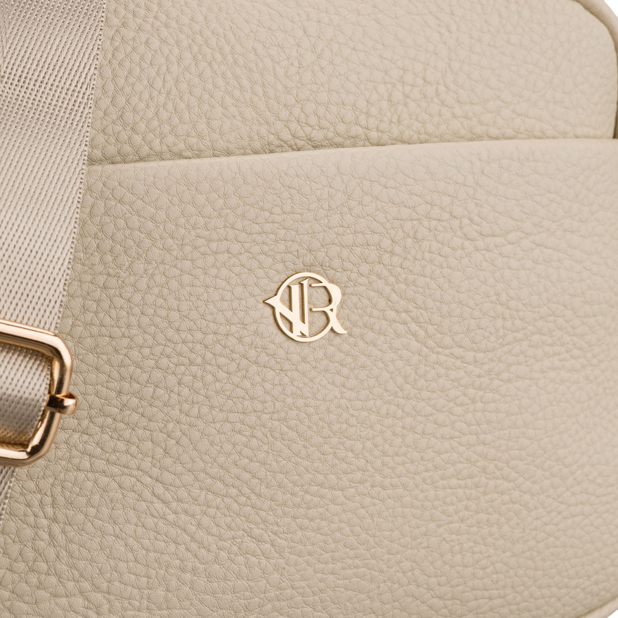 Torebka-listonoszka crossbody z kieszeniami na suwak, wykonana ze skóry ekologicznej w beżowym kolorze - Rovicky