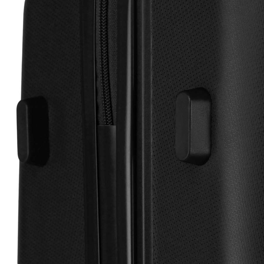 Czarna walizka podróżna w średnim rozmiarze z teleskopowym uchwytem i kółkami obrotowymi - Peterson