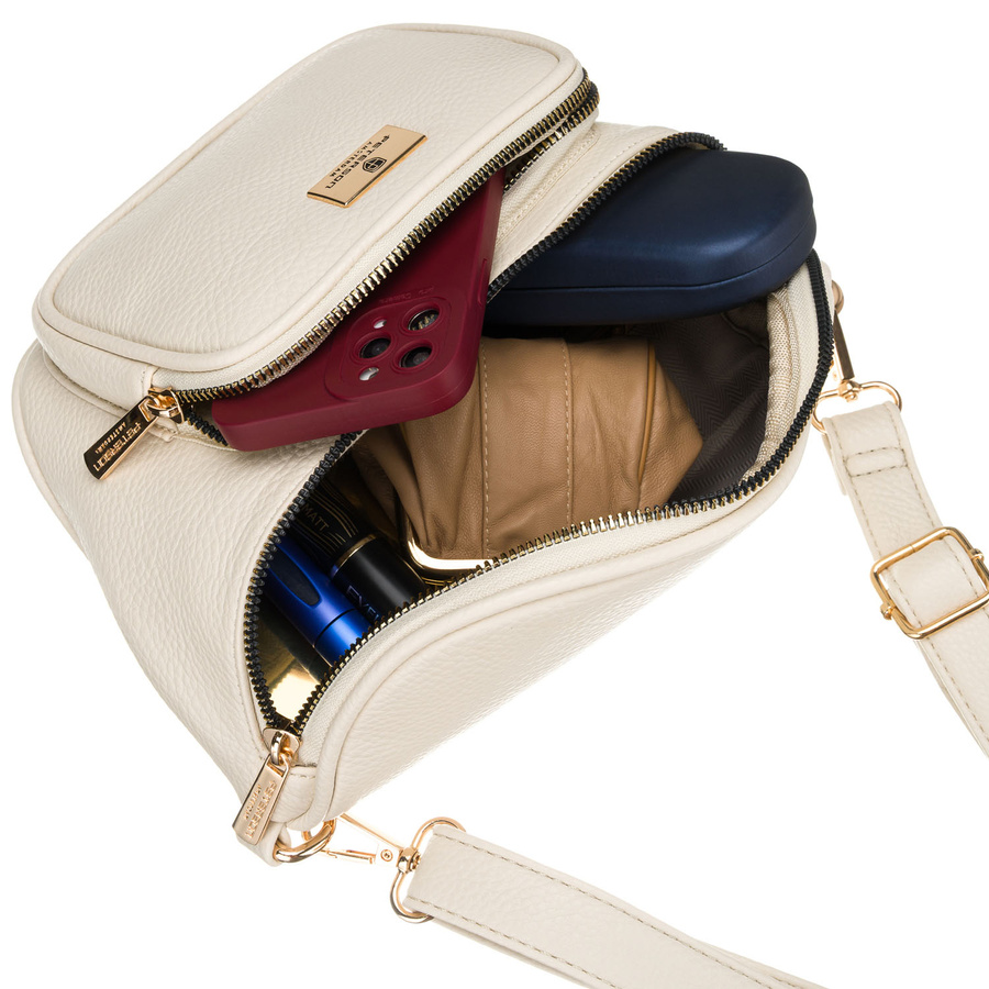 Jasnobeżowa saszetka damska ze skóry ekologicznej zamykana suwakiem - Peterson