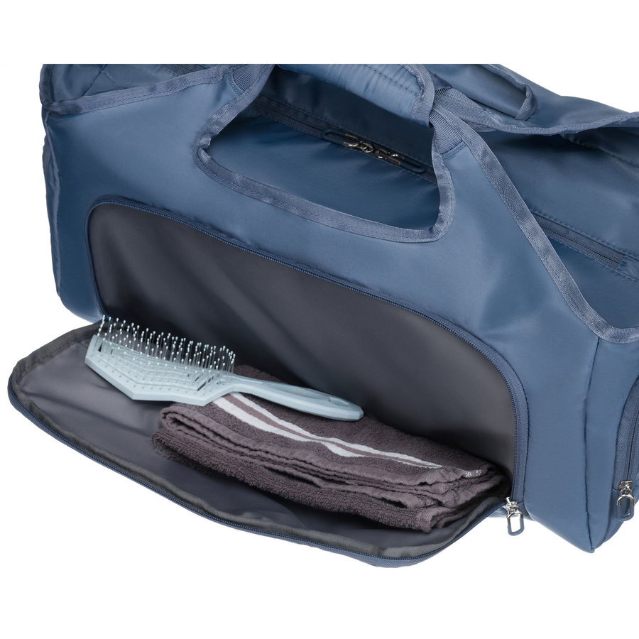 Niebieska, weekendowa torba podróżna wyposażona w uchwyt na walizkę - Peterson