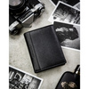 Zestaw prezentowy: skórzany, pionowy portfel męski w czarnym kolorze bez zapięcia i czarny pasek ze skóry ekologicznej - Peterson