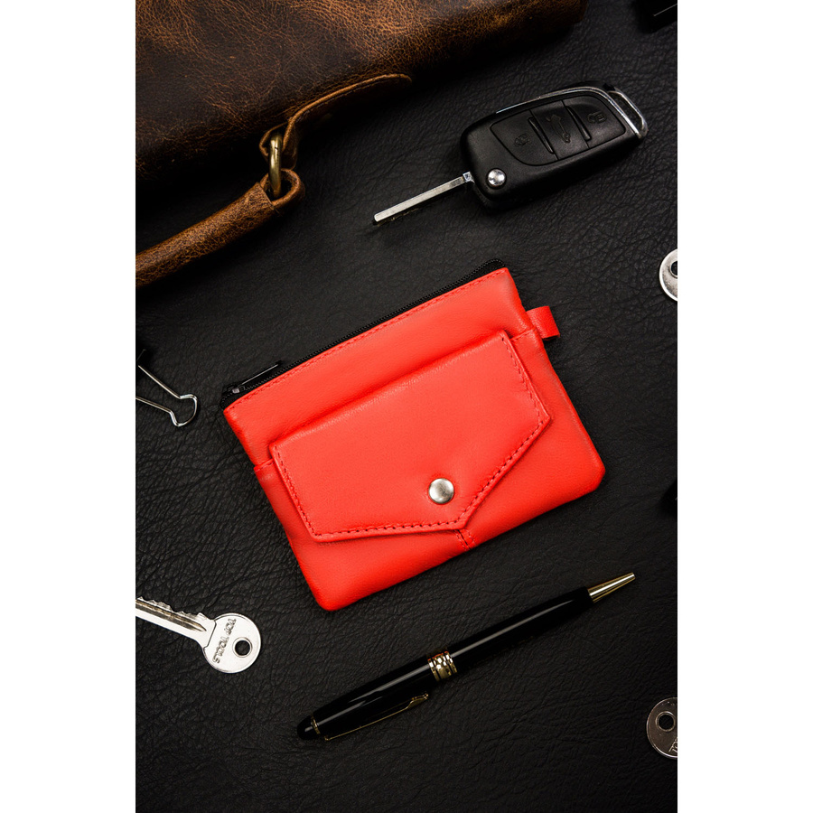 Kluczówka ze skóry naturalnej w pomarańczowym kolorze z kieszonkami na suwak