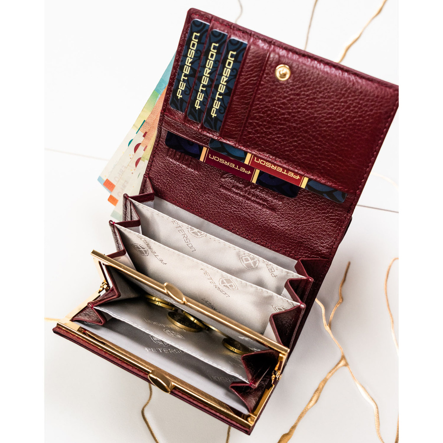 Skórzany portfel damski zamykany na zatrzask, odszyty ze skóry naturalnej i ekologicznej w fioletowym kolorze - Peterson