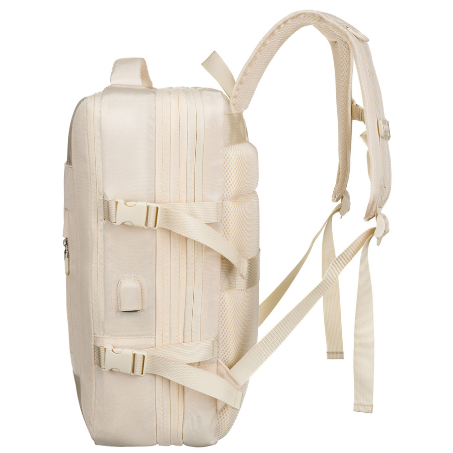 Praktyczny plecak podróżny w kolorze ecru, wyposażony w siatkowaną przegrodę i paski kompresyjne - Peterson