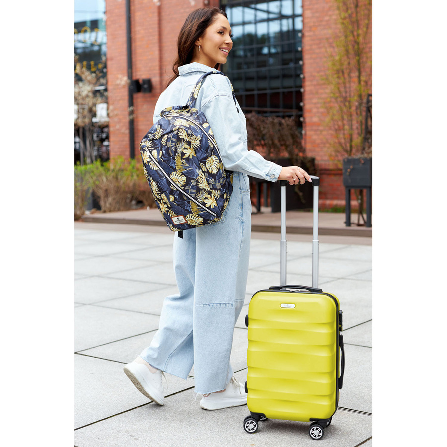 Średnia walizka z tworzywa ABS+ w żółtym kolorze wyposażona w szyfrowany zamek - Peterson