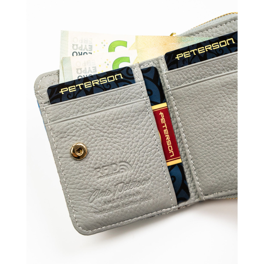 Niebieski, poręczny portfelik damski ze skóry naturalnej z systemem RFID, zamykany zatrzaskiem i suwakiem - Peterson