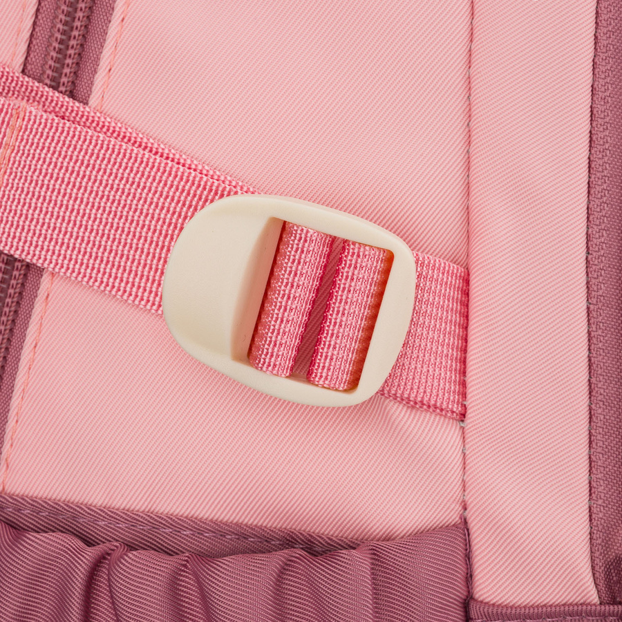 Pojemny plecak szkolny z poliestru w różowym kolorze zawieszony na regulowanych szelkach - Peterson