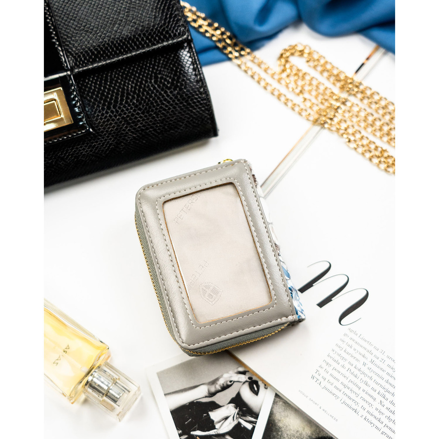 Niebieski, poręczny portfelik damski ze skóry naturalnej z systemem RFID, zamykany zatrzaskiem i suwakiem - Peterson