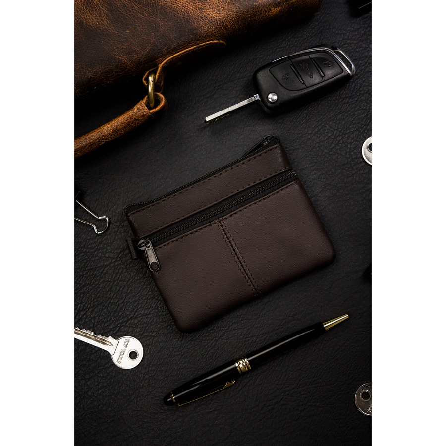 Etui ze skóry naturalnej w ciemno brązowym kolorze z kieszonkami na suwak