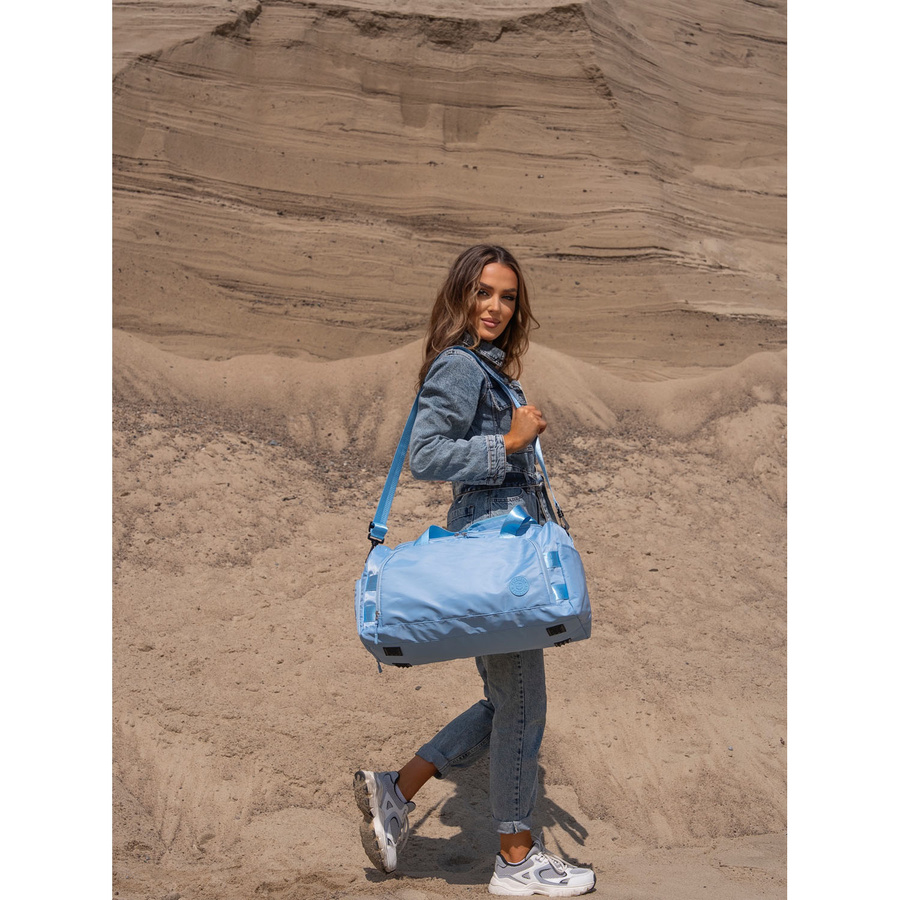 Weekendowa torba podróżna w błękitnym kolorze z uchwytem na walizkę - Peterson
