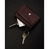 Etui ze skóry naturalnej w brązowym kolorze z kieszonkami na suwak