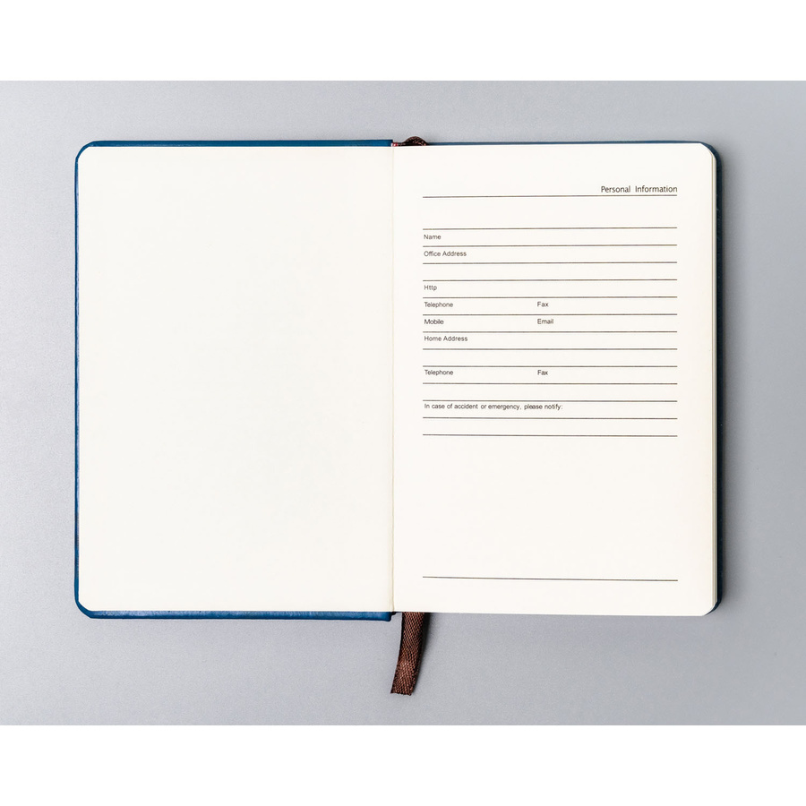 Niebieski notes w formacie A6 zadrukowany w kropki - Peterson