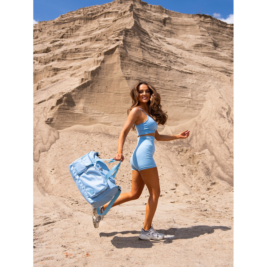 Błękitna, sportowa torba podróżna z poliestru z paskiem na ramię i uchwytem na walizkę - Peterson