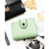 Zielony portfel damski ze skóry ekologicznej zamykany na suwak i zatrzask - Peterson