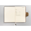 Beżowy notes w formacie A5 zadrukowany w linie - Peterson