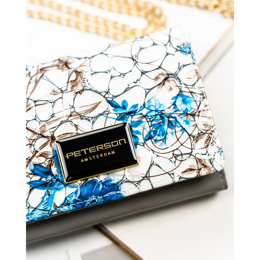 Portfel damski ze skóry naturalnej w niebieskim kolorze ozdobiony kwiatowym wzorem - Peterson