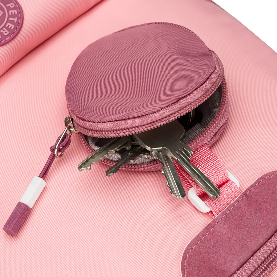 Pojemny plecak szkolny z poliestru w różowym kolorze zawieszony na regulowanych szelkach - Peterson
