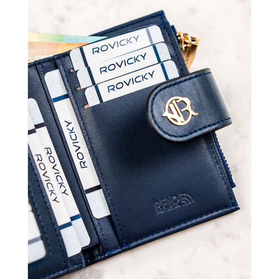 Granatowy portfel damski ze skóry ekologicznej zamykany na zatrzask i suwak - Rovicky