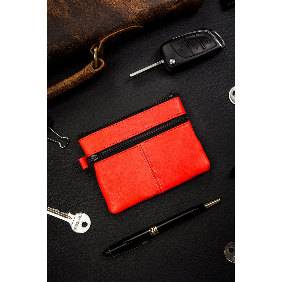 Kluczówka ze skóry naturalnej w pomarańczowym kolorze z kieszonkami na suwak