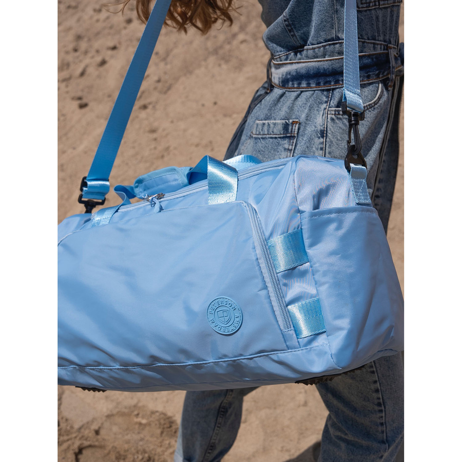 Weekendowa torba podróżna w błękitnym kolorze z uchwytem na walizkę - Peterson