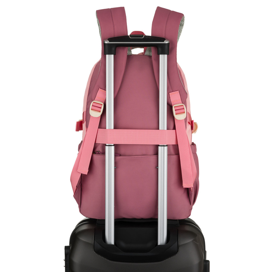 Pojemny plecak szkolny z poliestru w różowym kolorze zawieszony na regulowanych szelkach - Peterson