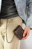 Duży, skórzany portfel męski bez zapięcia z tłoczonym wzorem