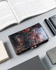 Skórzany portfel damski z biglem zdobiony motywem wężowej skóry - Lorenti